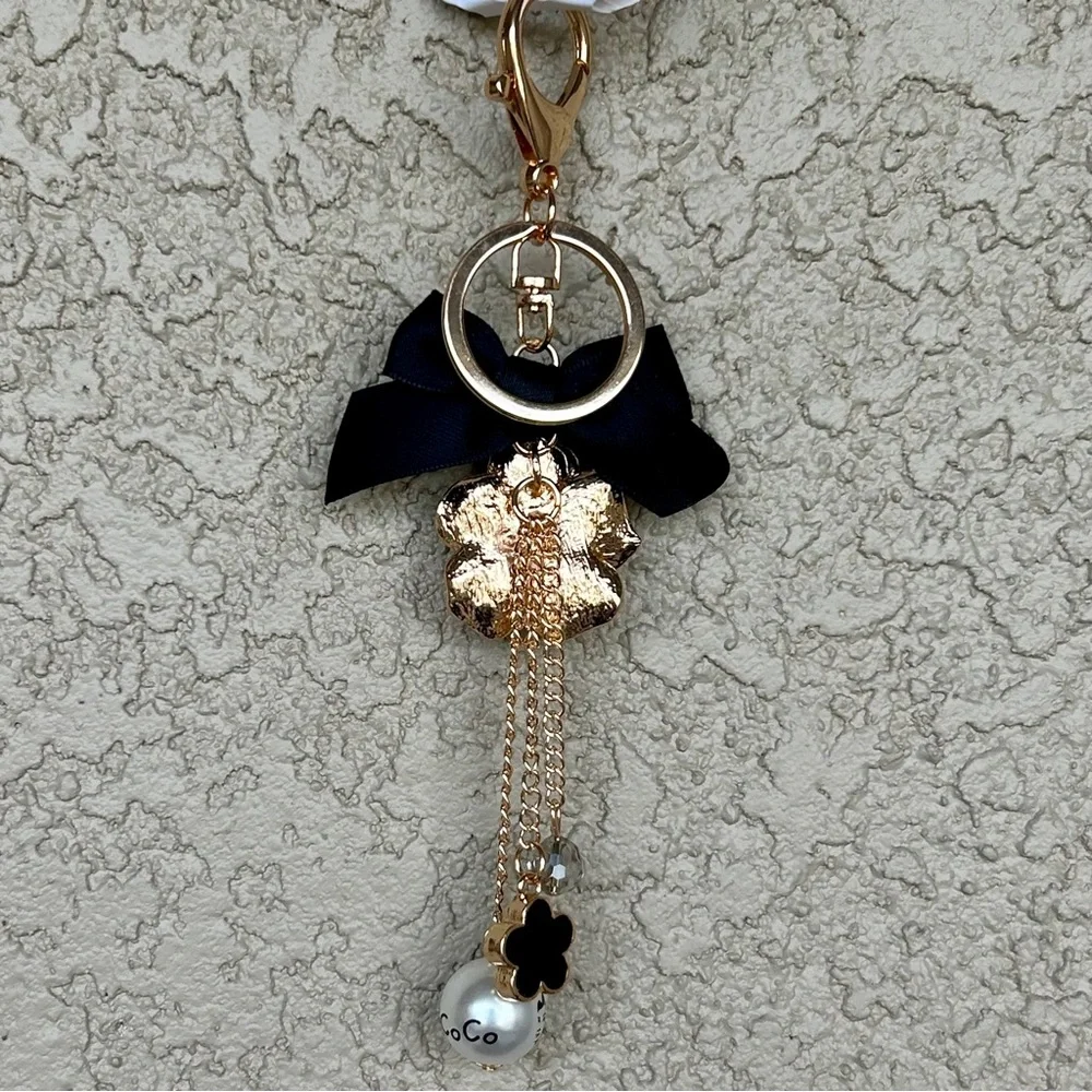 Luxe White Floral Keychain/Bag Charm with Black Bow